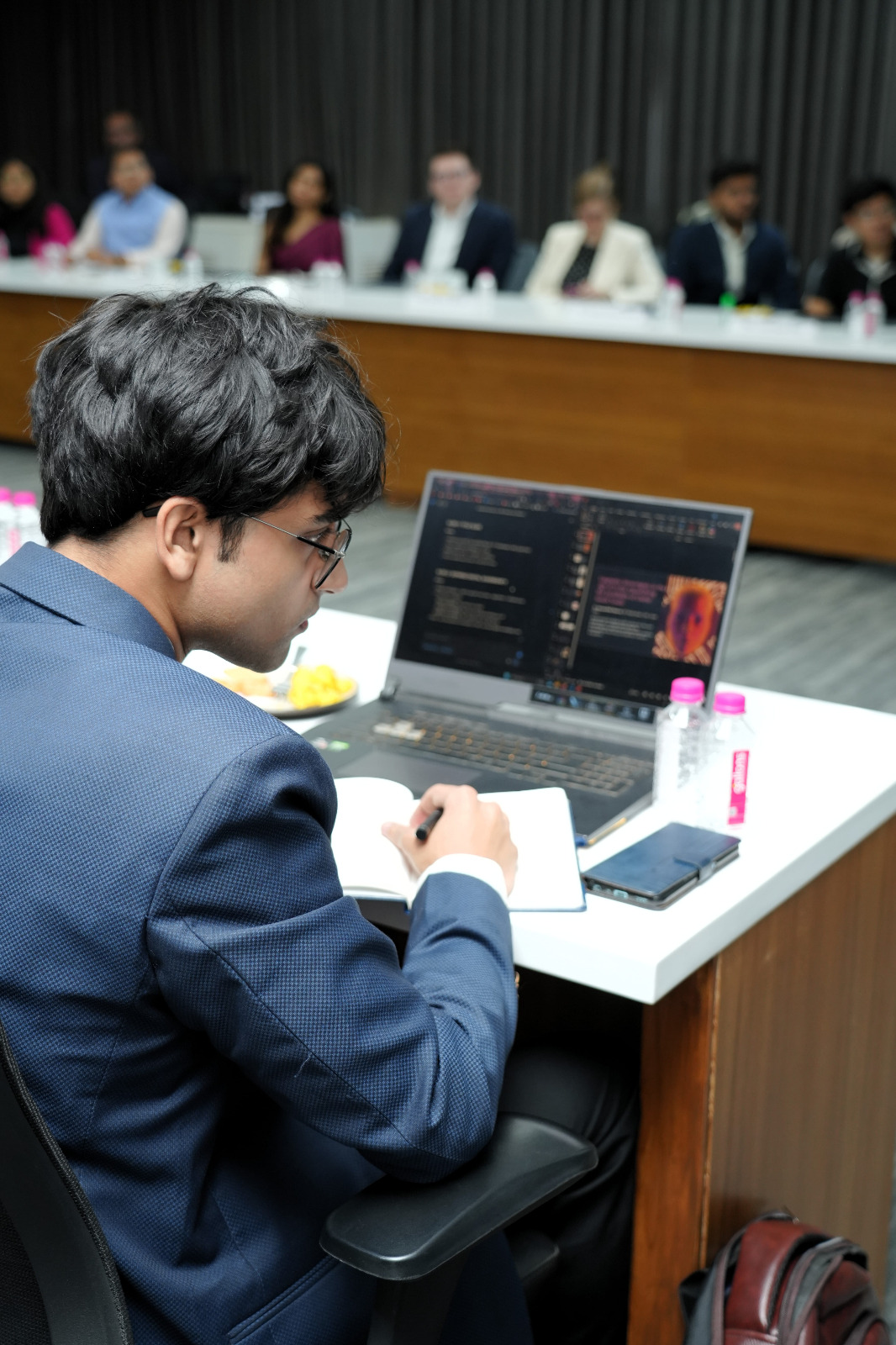 Soumedhik Bharati presenting at a conference